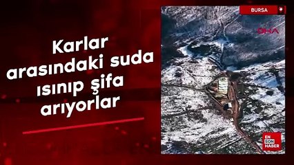Bursa'da karlar arasındaki suda ısınıp, şifa arıyorlar