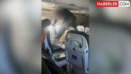 Uçak koltuğunu tekme atarak kırmaya çalışan, yolcu diğer yolcular tarafından etkisiz hale getirildi
