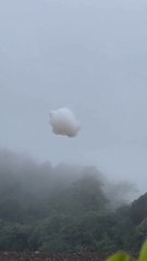 A cloud falls from sky near construction site in Indonesia
