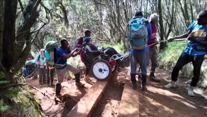 A Western Australian woman has climbed Mount Kilimanjaro in a trekking wheelchair