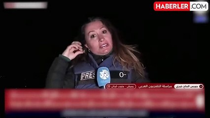 Lübnanlı muhabir ateşkes antlaşmasını kask ve çelik yeleğini çıkararak duyurdu