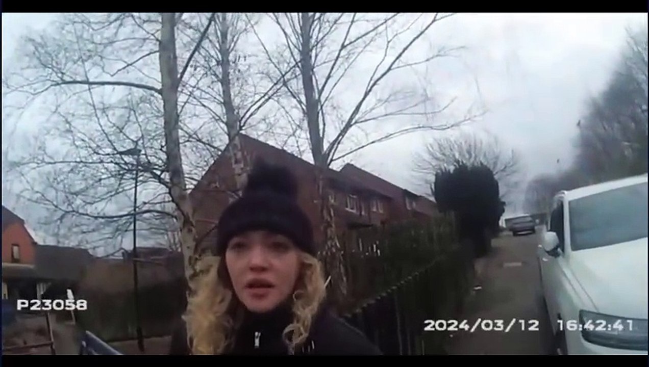 Murderer Rebecca Moore feigns shock as she is arrested for the murder of Sacad Ali