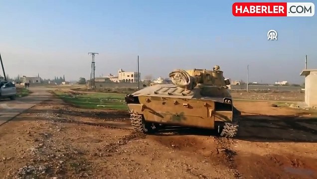 Türkiye'den Suriye'deki muhaliflerin ilerleyişiyle ilgili yapılan açıklamada Tel Rıfat ve Münbiç'e dikkat çekildi