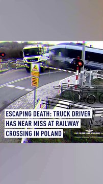 Escaping death: Truck driver has near miss at railway crossing in Poland