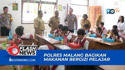 POLRES MALANG BAGIKAN MAKANAN BERGIZI BAGI PELAJAR TERDAMPAK BANJIR DI KECAMATAN SUMBERMANJING WETAN