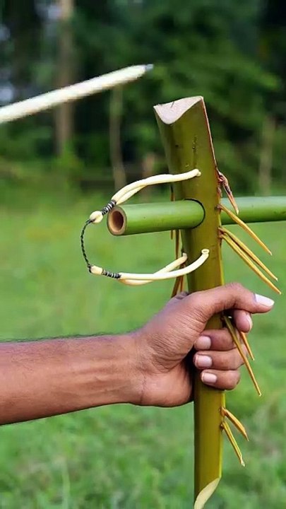 Bamboo slingshots with palm leaves