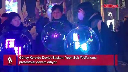Güney Kore'de sıkıyönetim kaosu sürüyor: Binlerce protestocu sokaklarda