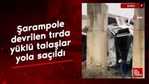 Bursa'da şarampole devrilen tırda yüklü talaşlar yola saçıldı