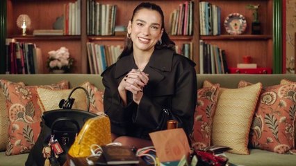 Dua Lipa’s Bag of Surprises: Books, Hot Sauce & Tangled Headphones 🎒
