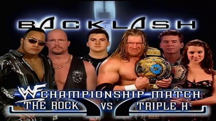 Triple H w/Stephanie McMahon Helmsley & Mr McMahon vs The Rock w/ Stone Cold Steve Austin (Shane McMahon As Special Guest Referee For The WWF Championship - Backlash 2000 30/4/00