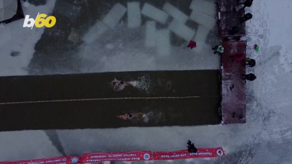 Why Are People So Crazy! These Locals in Siberia Welcome the Cold Weather By Swimming in a Frozen Lake