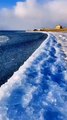 Ice waves on a high mountain lake, China.