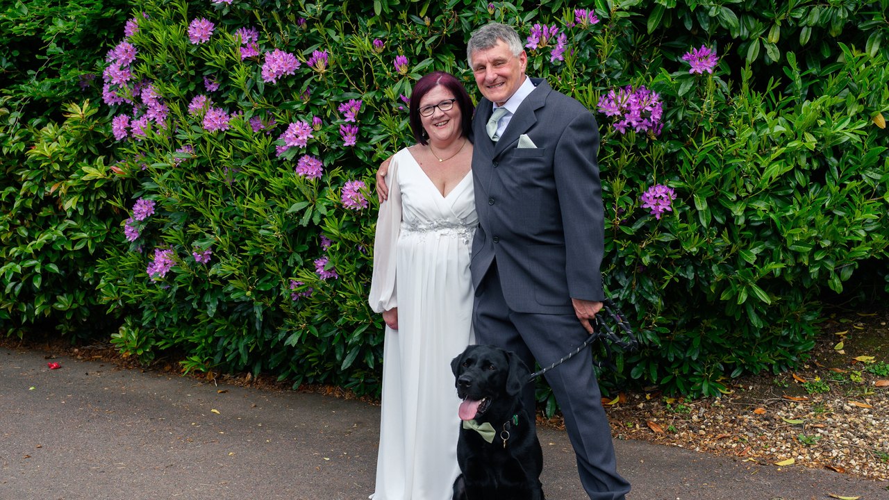 Nurse walks down the aisle with prosthetics after losing both legs to sepsis