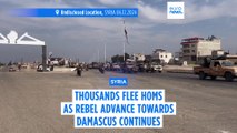 Thousands flee Homs as insurgents led by HTS advance on Syria's third-largest city