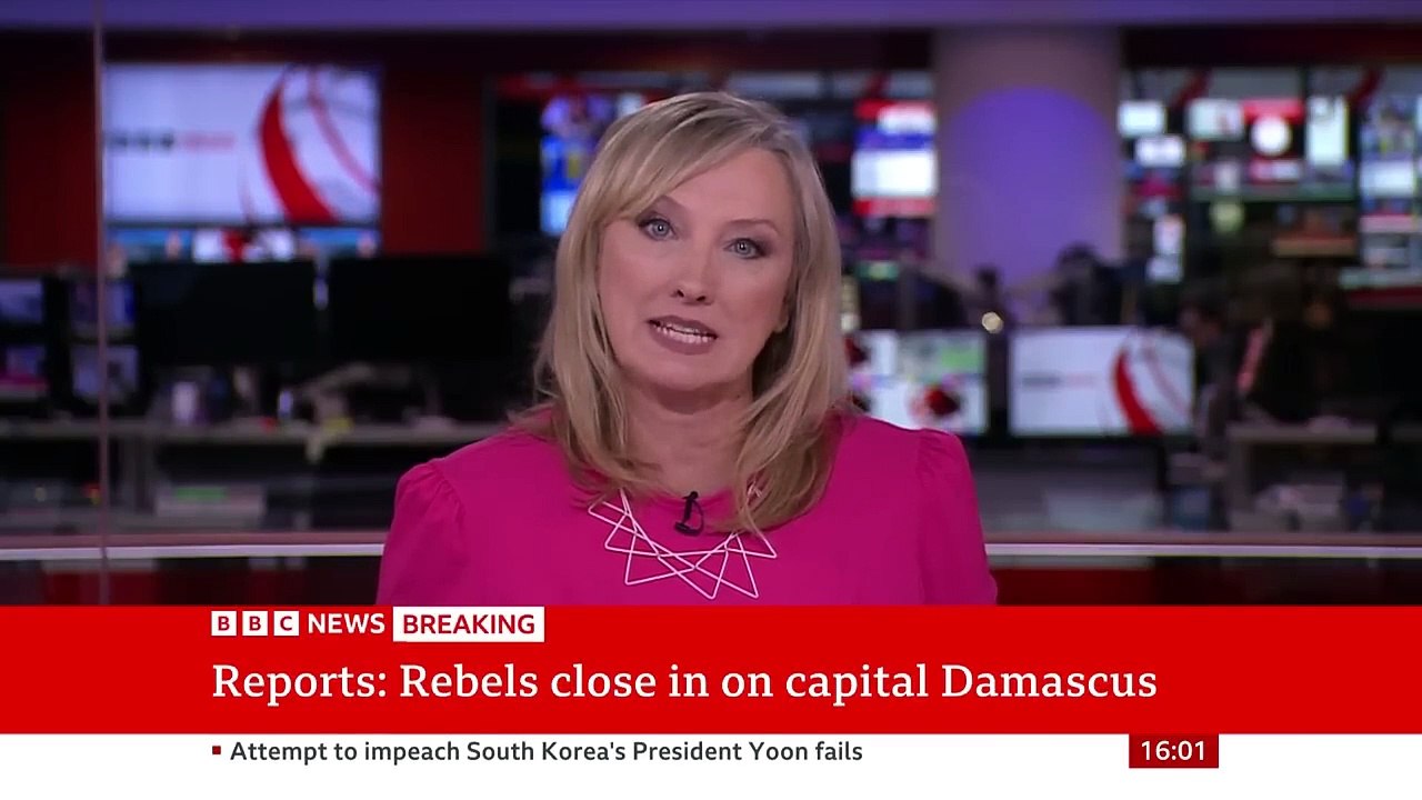 Syrian rebels close in on Damascus as presidency denies Assad has left capital _