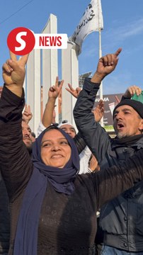 Our happiness is immense , Syrian woman says after rebels seize Homs