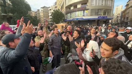 Syrians celebrate the fall of Assad's rule