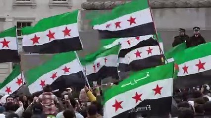 Syrians in London celebrate the fall of Assad