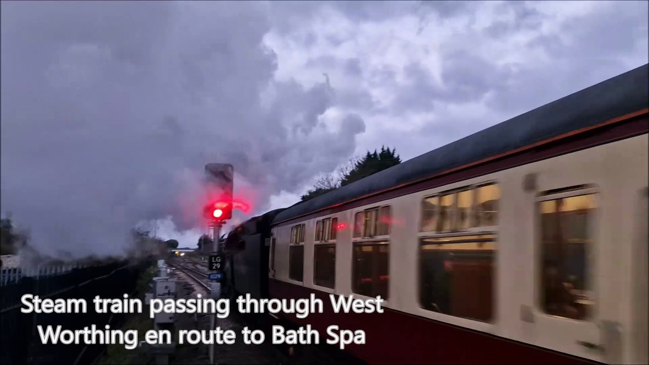 Steam train passing through West Sussex en rout...