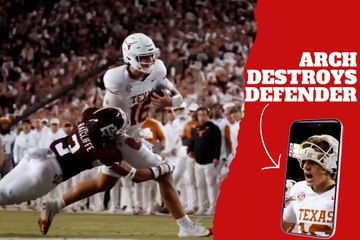 Arch Manning runs through a defender to score a touchdown against one of Texas’ biggest rivals