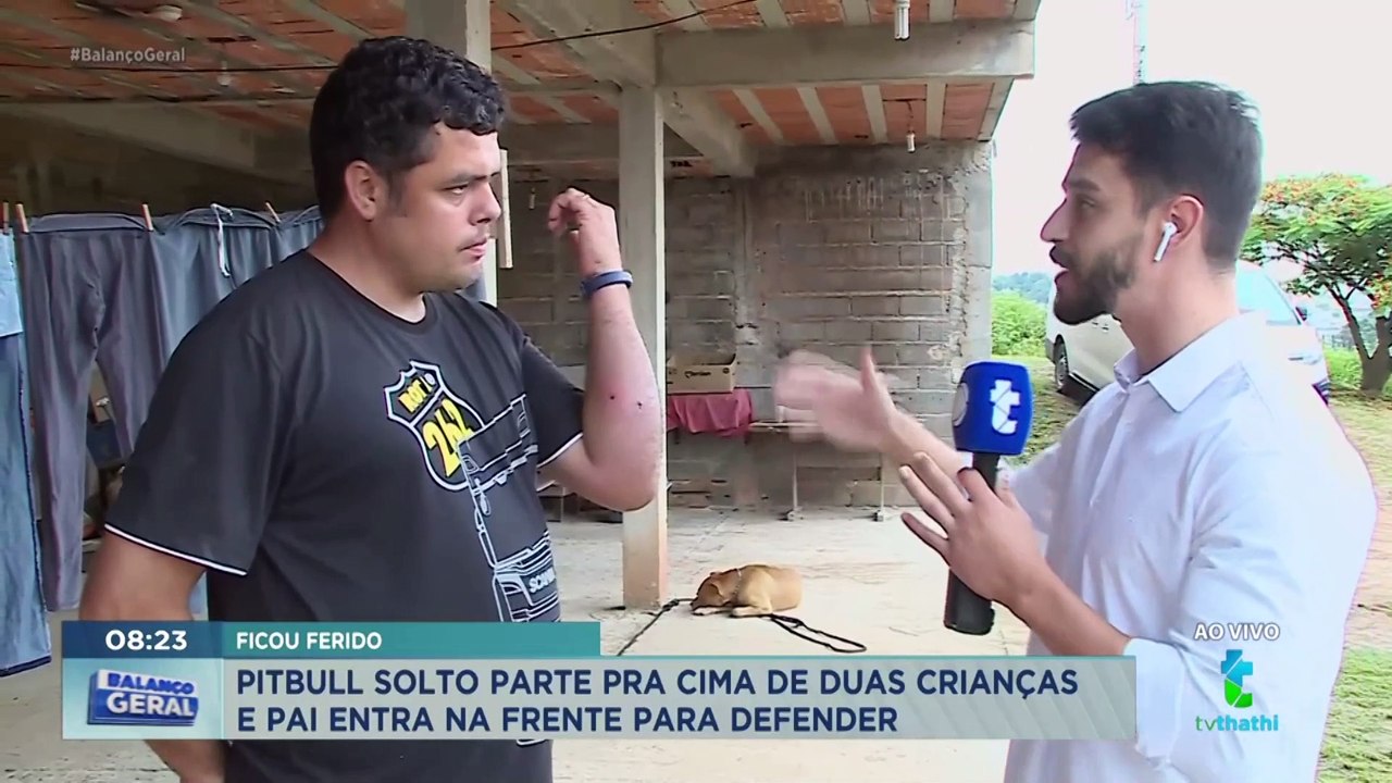 Pitbull solto na rua tenta atacar criança e pai é mordido ao defender