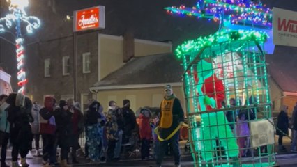 Webster Holiday Parade features hilarious moment with The Grinch locked up and unable to escape