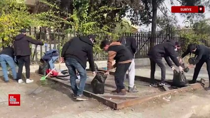 Suriye'nin başkenti Şam'da gönüllü gençler sokakları temizliyor