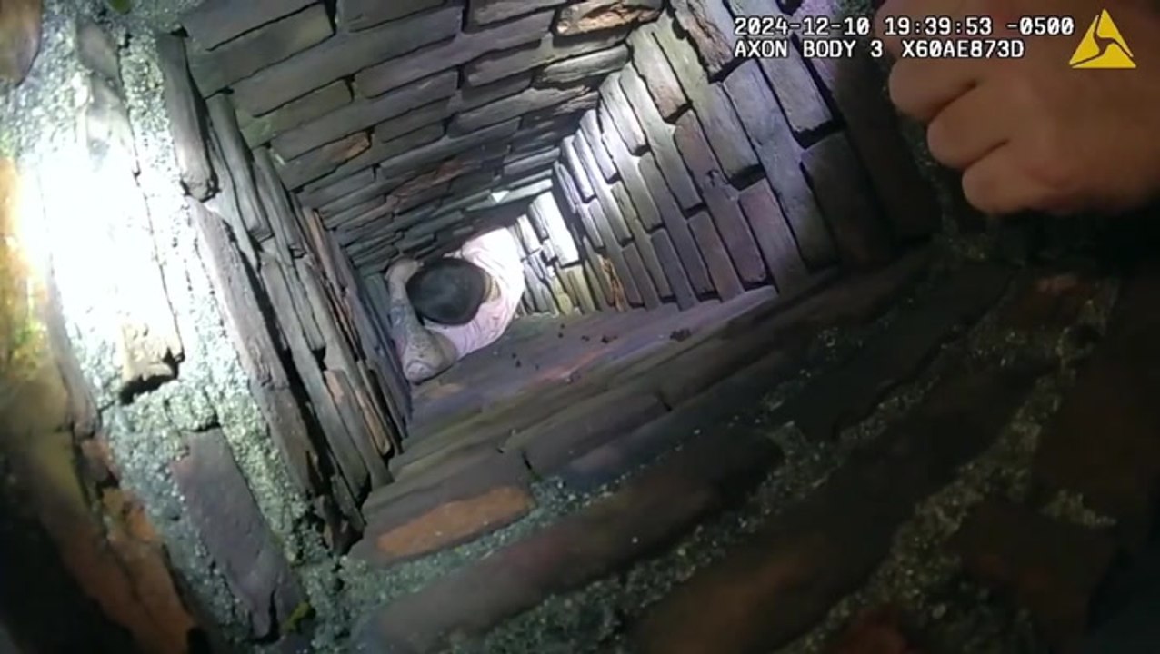 Fugitive gets stuck in chimney trying to hide from police