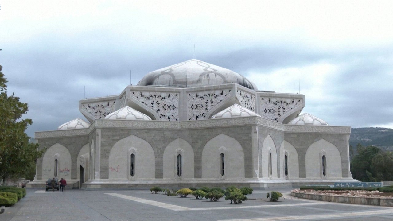 Amid ashes of Assad family's mausoleum, Syrian rebels vow to erase their legacy