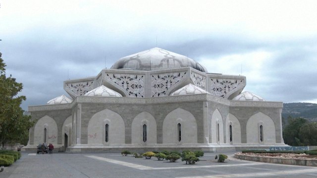 Amid ashes of Assad family's mausoleum, Syrian rebels vow to erase their legacy