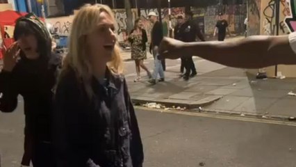 Duck under the arm prank: Woman ducks blindly for one minute while man walks off