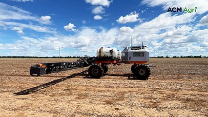 SwarmFarm bot on grain farm east of Surat