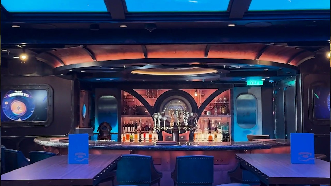 Bennett chats with Alyssa on the Periscope Pub Aboard the Disney Treasure