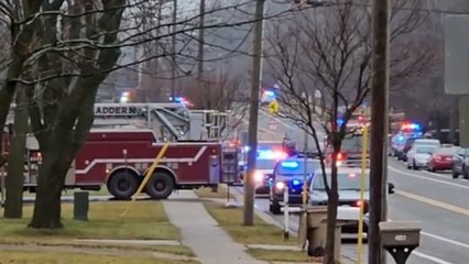 Emergency crews line the street in front of Abundant Life Christian School after shooting