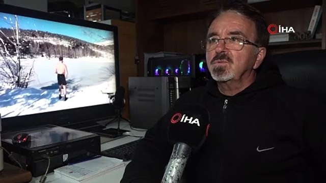 Biz izlerken donduk! Buz gibi zirvenin buz gibi suyunda yüzdü...