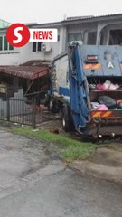 Out-of-control garbage truck crashes into Kajang homes