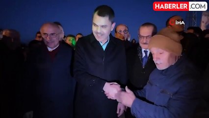 Bakan Kurum'dan köy evlerine taşınan depremzede aileye ziyaret