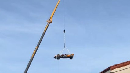 McLaren investor's idea of Christmas decorations is putting an F1 car on their front lawn