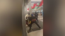 Chicago Airport chaos: four men brawl using wet floor signs as weapons