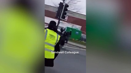 Shocking moment gang of youths chase each other with machetes