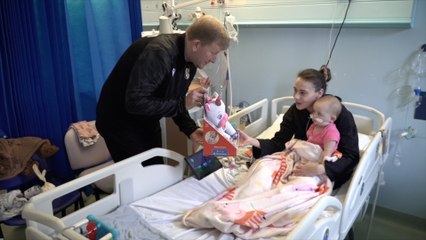 Dartford FC donate Christmas presents to sick children in hospital