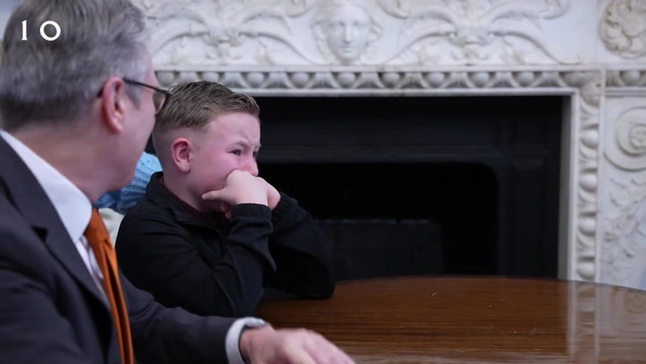Moment Starmer comforts emotional child after surprise Christmas call to military families
