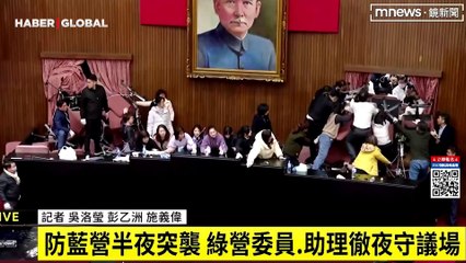 Tayvan'da ortalık karıştı: Parlamentoda başlayan kavga sokağa taştı!