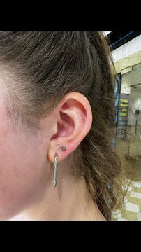 Lobe Love: The Art of Stacked Piercing #stackedpiercing #earpiercing #nosepiercing #bellypiercing