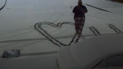 Wholesome moment: Woman expresses her love in the snow during the first snowfall of 2024