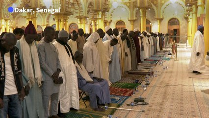 Senegalese Muslims pray for their country to mark the start of Ramadan