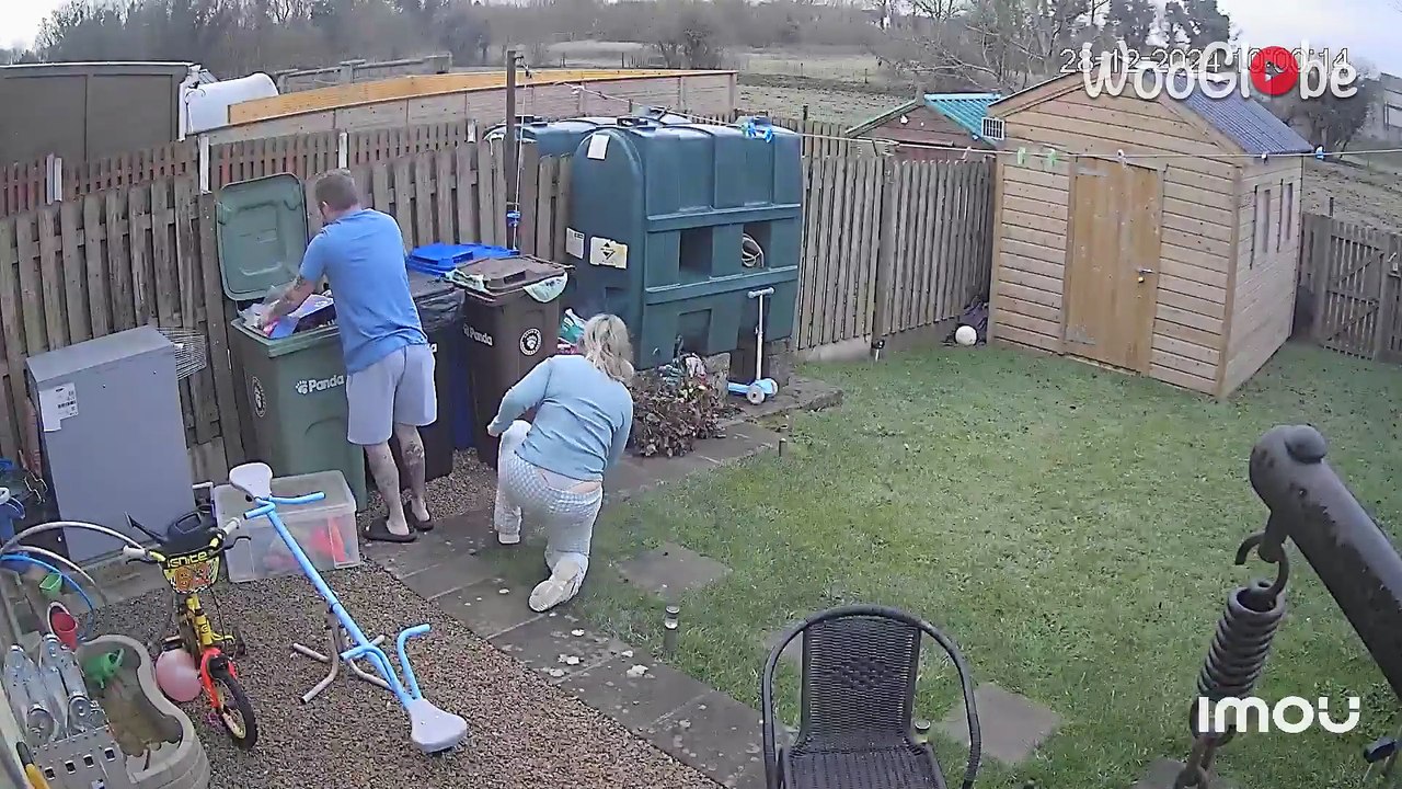 Woman's attempt to make more space in the bin ends in a hilarious unexpected fall