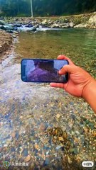Beautiful pebbles in the river water
