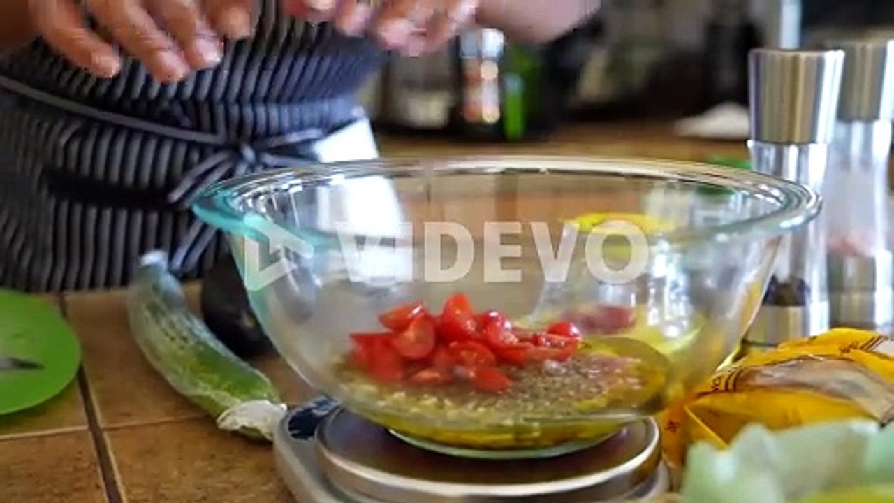 Adding cut tomatoes to the olive oil, vinegar, and shallot dressing for a chopped salad - ANTIPASTO SALAD SERIES