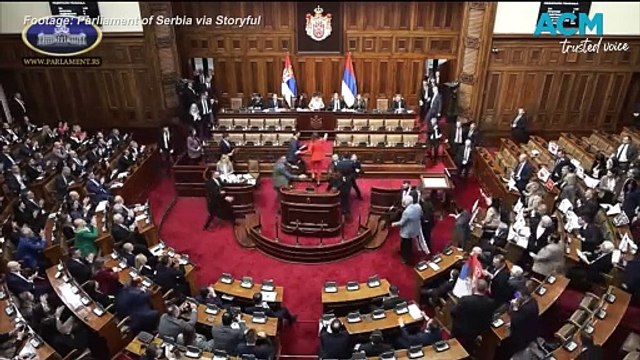 Chaos in Serbian parliament as flares and smoke bombs go off